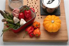 a chopping board with various condiments on it 