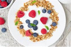 bowl of cereal with fruits on top