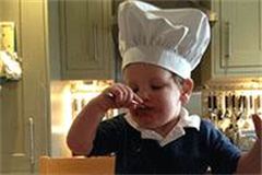 toddler with chefs hat on 
