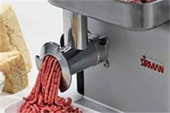 sirman mincer with mince being minced, Parmesan cheese