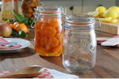 two glass clip top preserve jars 