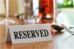 reserved sign on a table top