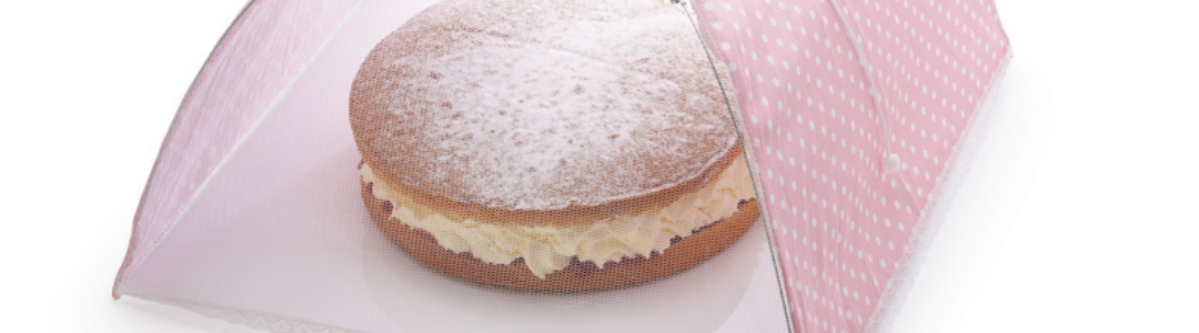 ink net food cover covering a Victoria sandwich