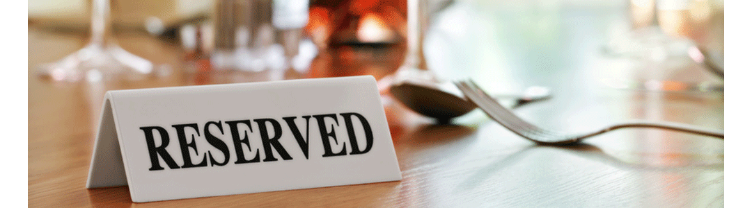 reserved sign on a table top