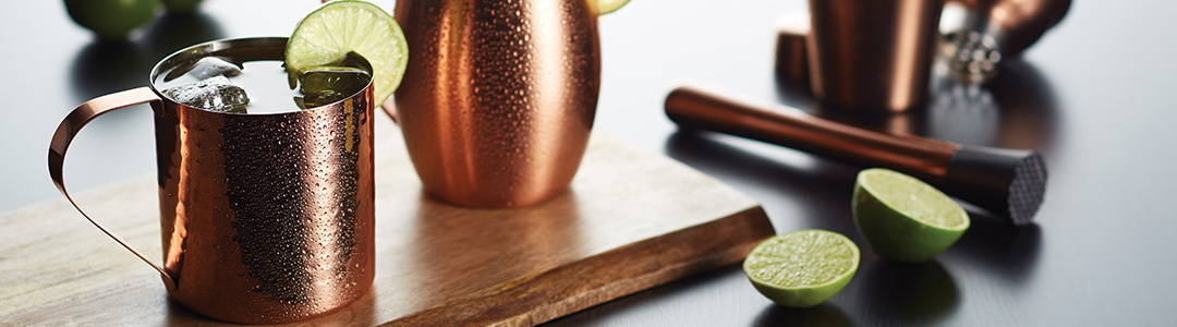 copper mug, cocktail shaker and cocktail making equipment