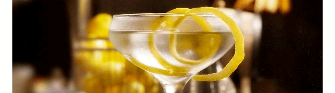 cocktail glass containing lemon cocktail