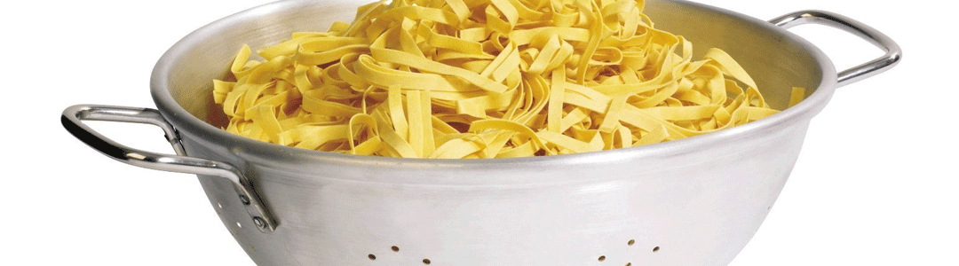 aluminium colander full of pasta 