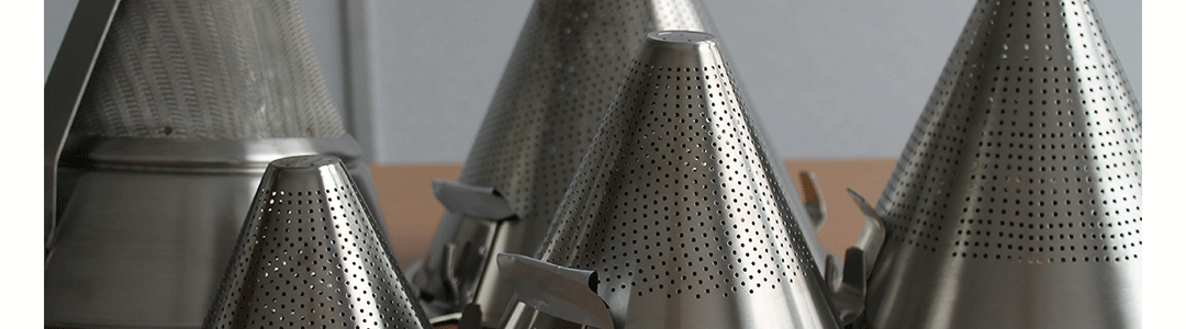 variety of different sized stainless steel conical strainers 