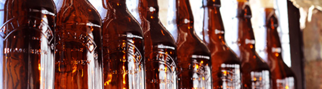 line of brown kilner beer bottles