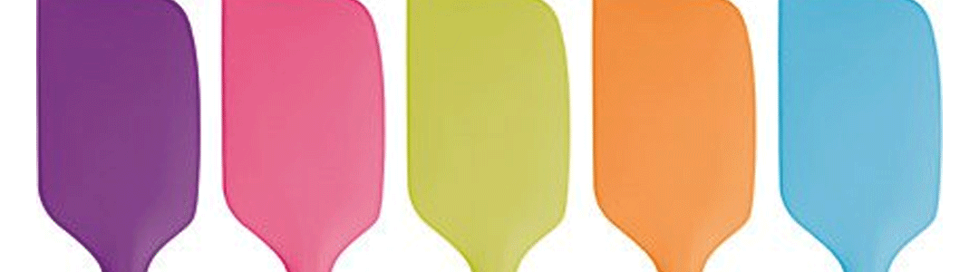 different coloured spatulas side by side 