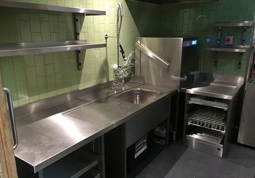 Professional wash area with stainless steel tops